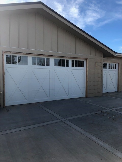Carriage doors with X overlay & windows