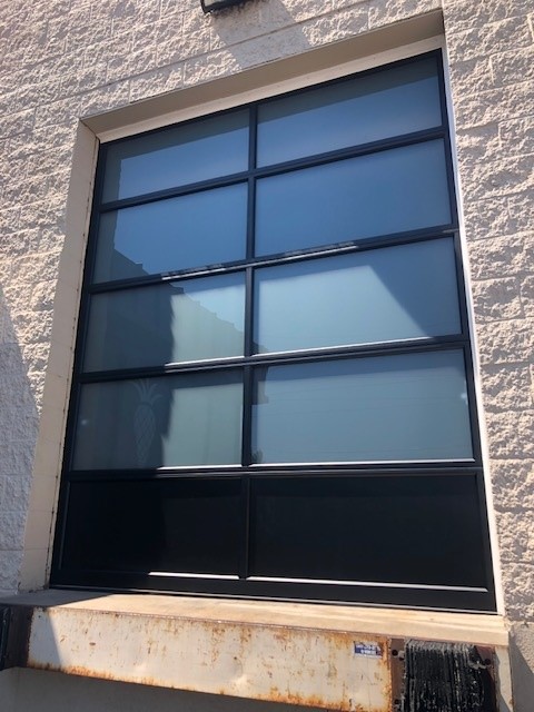 Commercial full-view door with frosted glass
