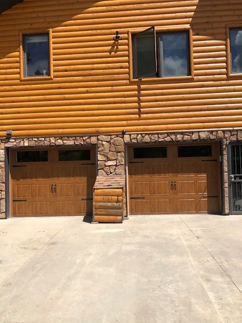 Woodgrain short-panel doors with tinted glass