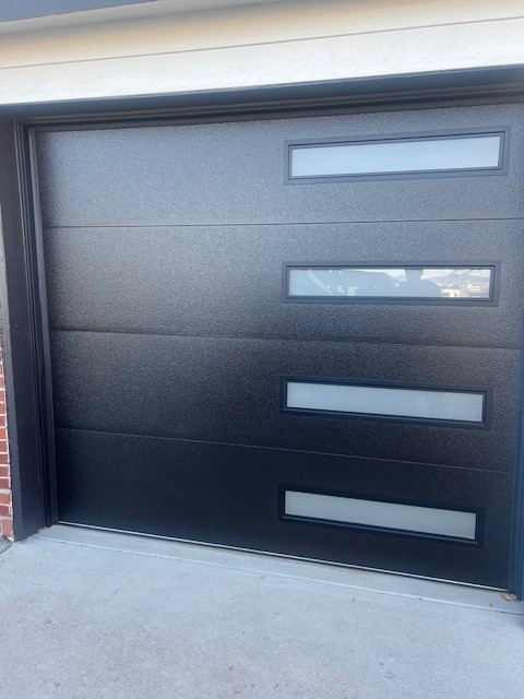 Black flush door with frosted glass windows