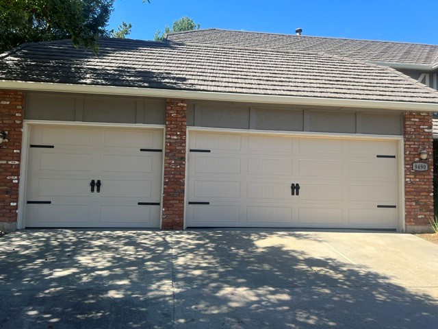 Long-panel doors with decorative hardware