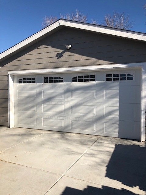 White long-panel door with arched windows