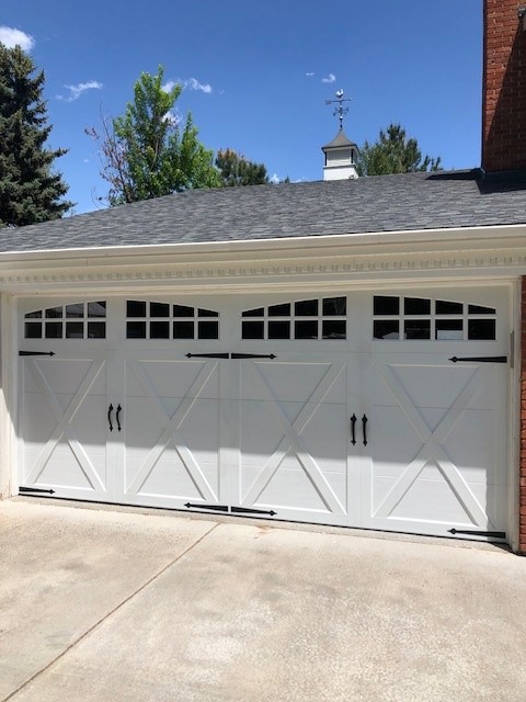 Carriage-house door with X overlay & arched windows